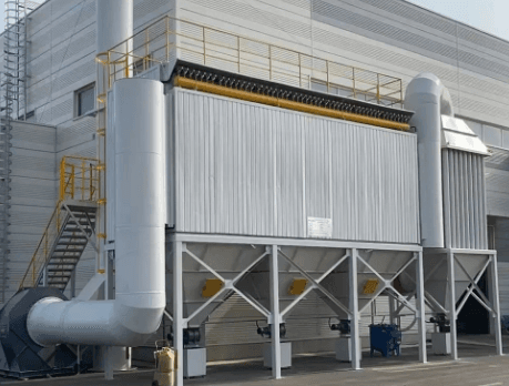 Outdoor baghouse dust collector with ductwork and steel support structure